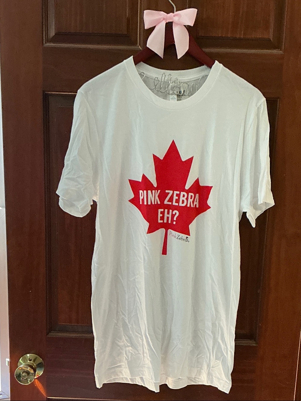 Pink Zebra White Tee with Red Maple Leaf Logo
